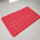 The bathroom mat is bright red